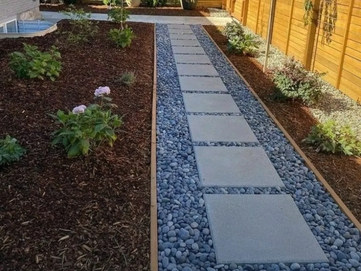 Paver walkway with river rock